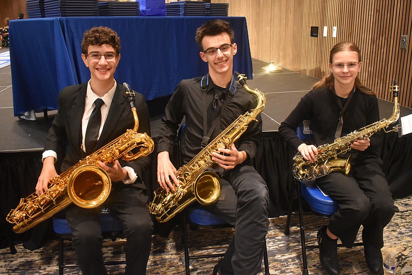Lakewood Ranch Preparatory Academy underclassmen Benjamin Corbo, Parker McDaniel and Grace Ghylin play the National Anthem at the commencement ceremony May 20.
