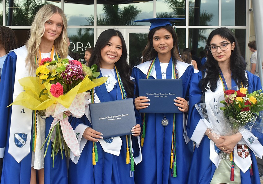 Hailey Wood, Ashley Tran, Sharon Dsouza and Sara Johnson get together after graduating from Lakewood Ranch Preparatory Academy after the commencement ceremony at The Ora in Sarasota.