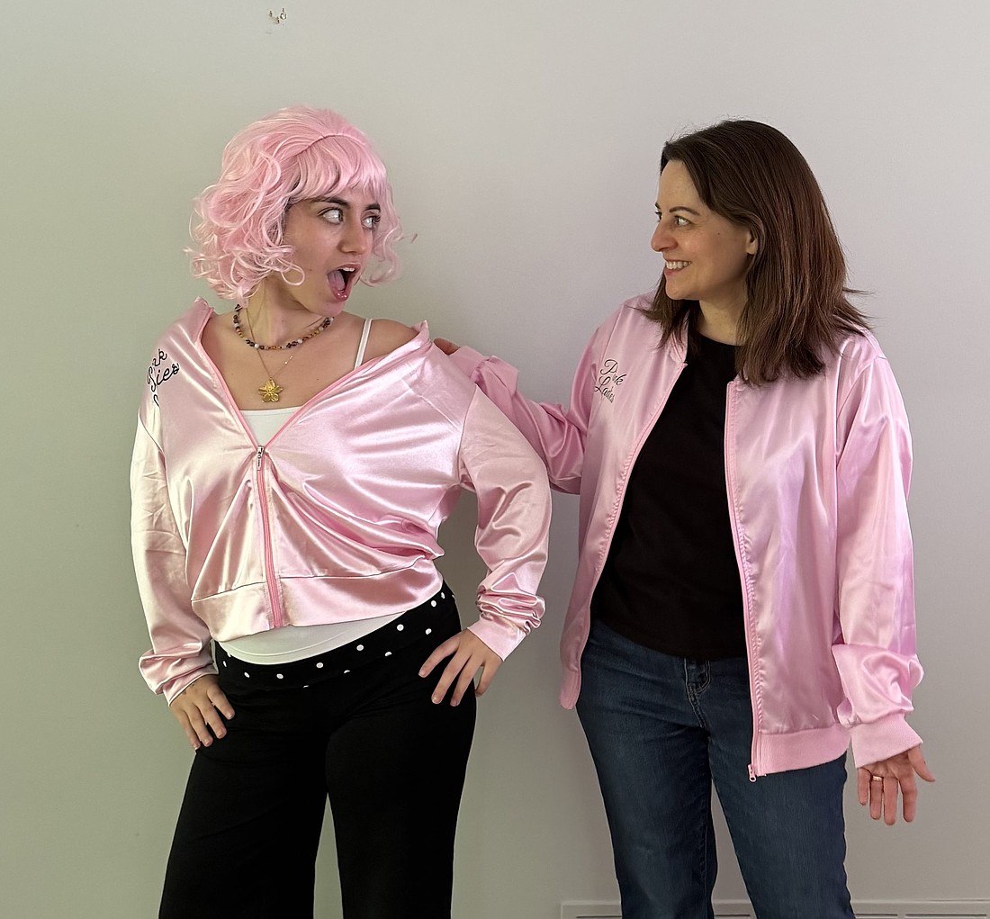Kallista Schneiderman and Kelly Haramis rehearse for their upcoming performance of "Grease is the Word" at the Squeaky Wheel Fringe Festival, which runs from June 2-7.