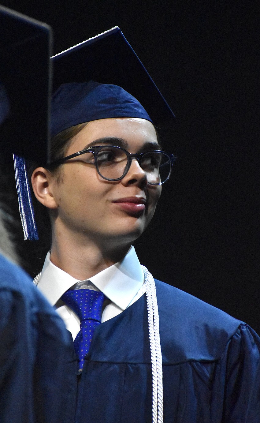 Valedictorian Hays Wilson says he took inspiration for his senior quote from the late Mike Newhams, a science teacher who died in December, who told him 