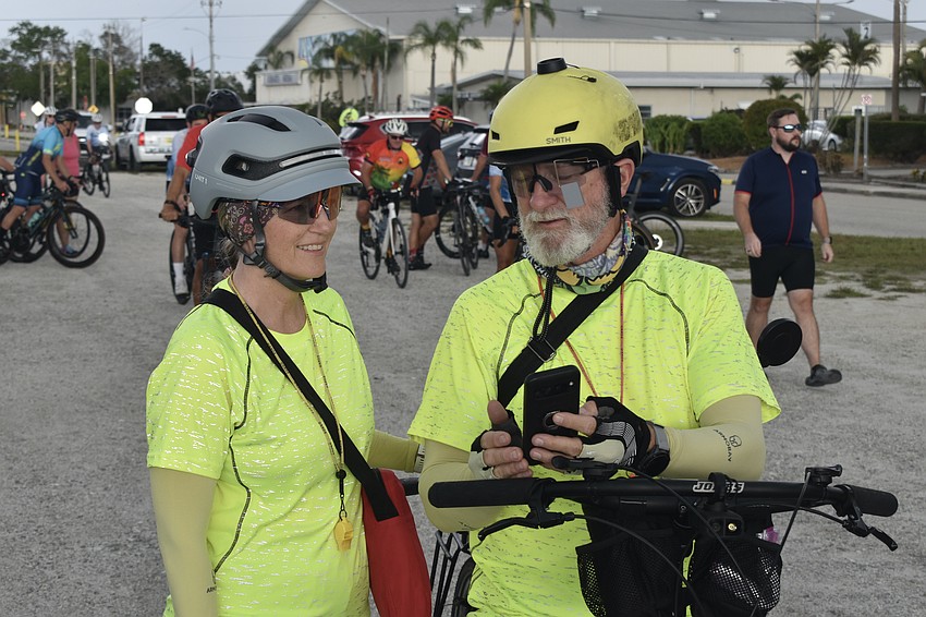Marcia and Danny Williams check the weather radar before they head out.