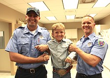 James Bacigalupi and Trevor Garofalo give Harry Noordzy a lift, just as they did five years ago at Station 12.