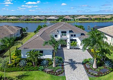 This Lake Club home at 8493 Pavia Way sold for $3.2 million. Built in 2022, it has four bedrooms, four-and-a-half baths, a pool and 3,499 square feet of living area.