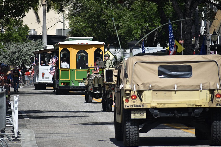 Vehicles make their way along the route.