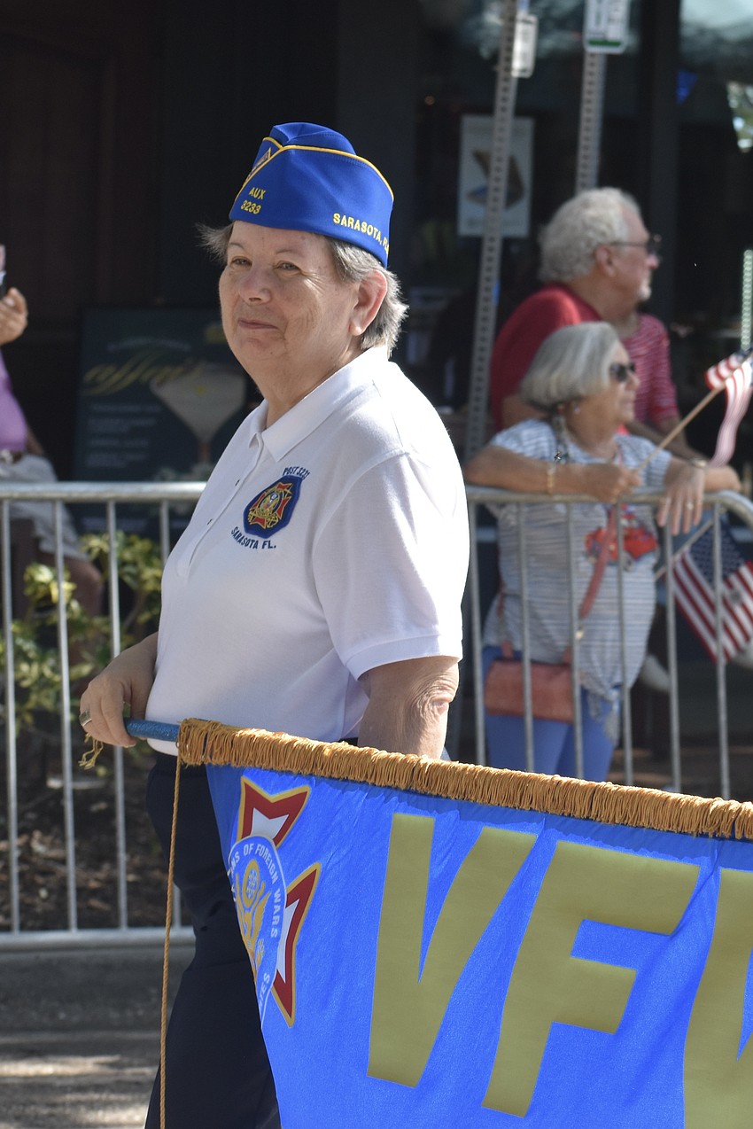 Nancy Monti of Veterans of Foreign Wars post 3233, walks in the parade.