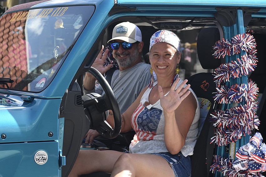 Kevin and Julie Seebeck make a pass in a jeep.