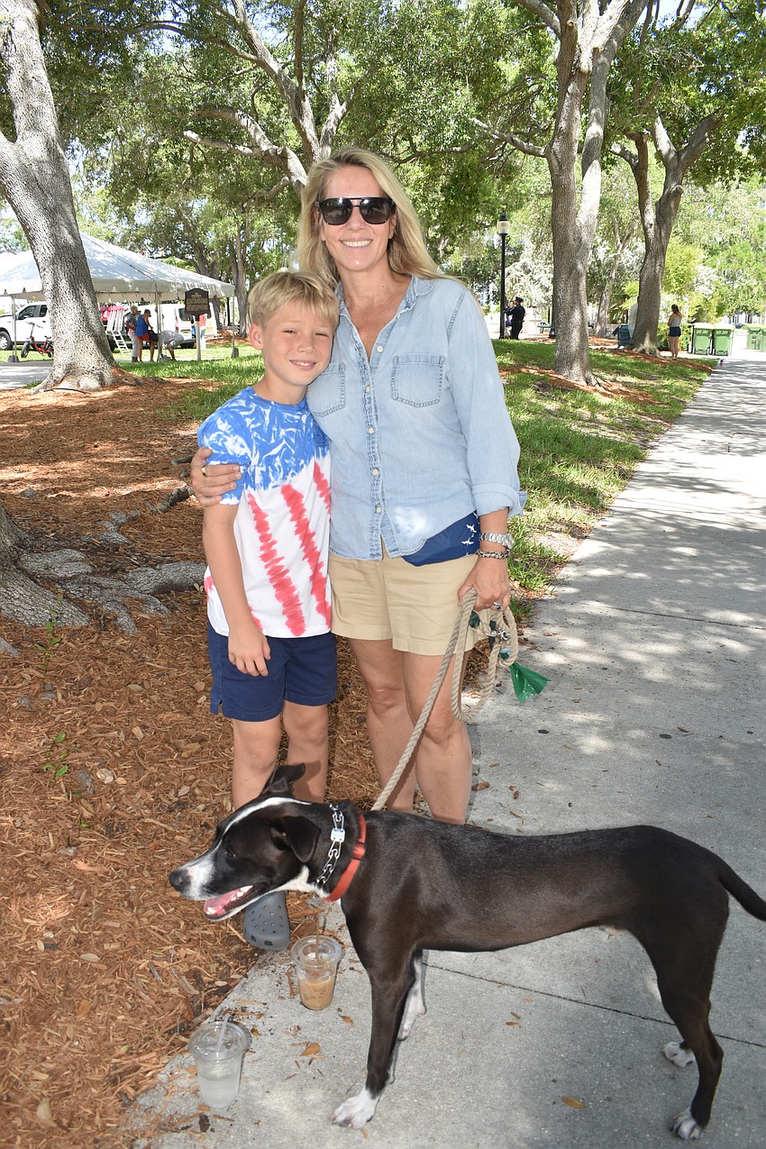 John Semmes, 10, Maura Semmes and Wrigley visit J.D. Hamel Park for the ceremony.
