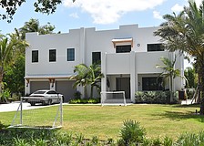 The first property at 943 Pomelo Place was built in 2005 and has four bedrooms, four-and-two-half baths, a pool and 5,764 square feet of living area. The second property was built in 2005 and has one bedroom, one bath and 528 square feet of living area.