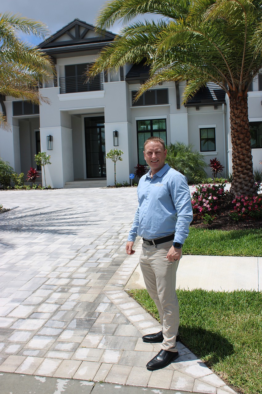 Stock Custom Homes Vice President Sam Canham says his company is raising the bar for elite homes in Lakewood Ranch.