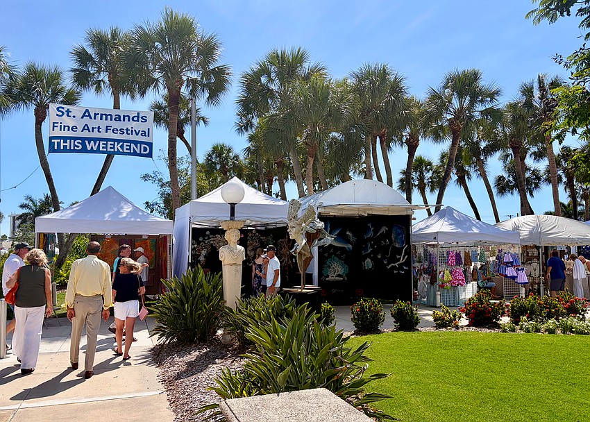 Even with the early summer heat setting in, visitors packed St. Armands Circle Park on Memorial Day weekend for a fine art festival.