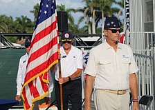 Mark Akerman, Jay Plager and Past Commodore Michael Landis carry away the colors at the conclusion of Bird Key Yacht Club's Memorial Day ceremony on May 25.