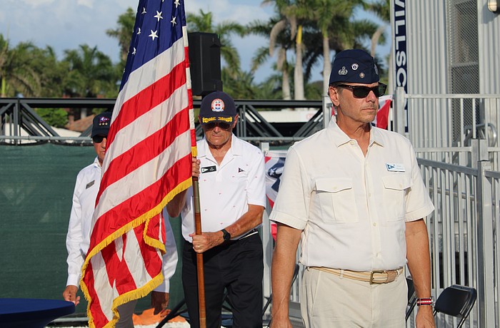 Mark Akerman, Jay Plager and Past Commodore Michael Landis carry away the colors at the conclusion of Bird Key Yacht Club's Memorial Day ceremony on May 25.