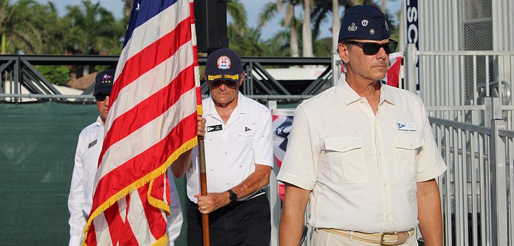 Mark Akerman, Jay Plager and Past Commodore Michael Landis carry away the colors at the conclusion of Bird Key Yacht Club's Memorial Day ceremony on May 25.