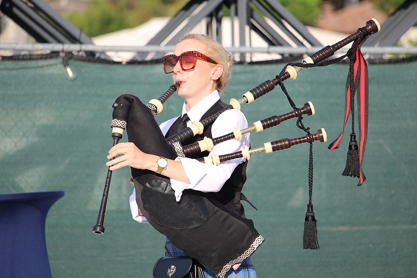 Bagpiper Gemma Briggs returned to Bird Key to perform at the Memorial Day ceremony Monday evening.