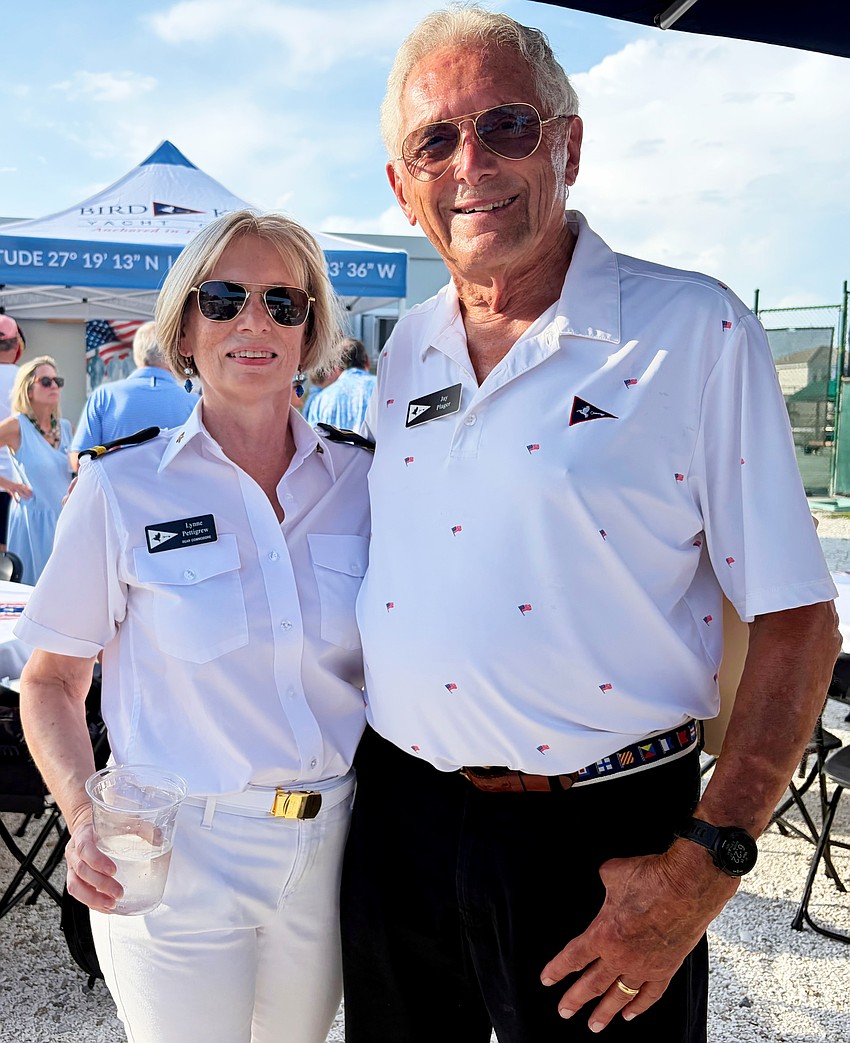 Rear Commodore Lynne Pettigrew and Jay Plager, a color guard member, both served roles at the Bird Key Yacht Club's Memorial Day event.