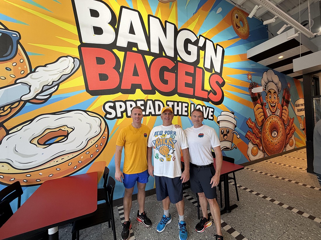 From left, Augie DeBiase, Mark DeBiase and Andrew Maider opened the concept they call "Bang’n Bagel Company" at 13423 Beach Blvd., their “longtime dream.”