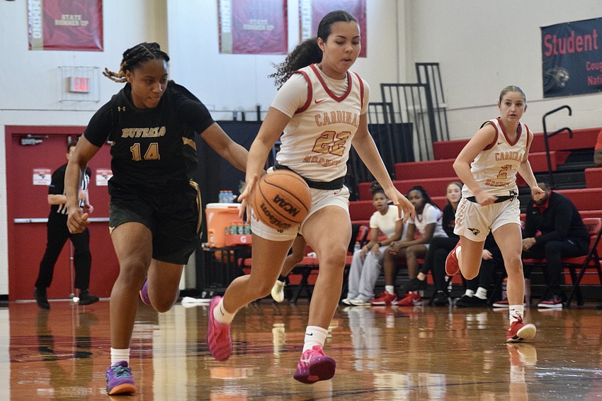 Rising junior guard Emily Wilson (center) offers continuity for Amanda Boswell to work with in her first year as the Cougars' coach. Rising junior guard Emily Wilson (center) offers continuity for Amanda Boswell to work with in her first year as the Cougars' coach.