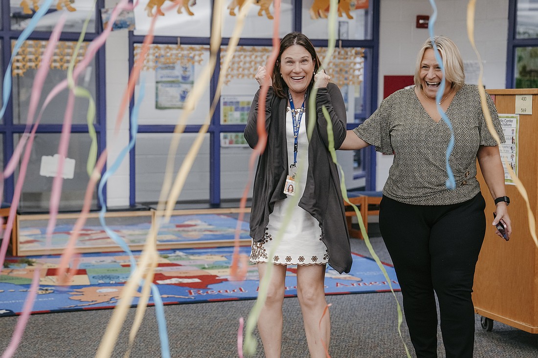 Stacy Lenz, a teacher at Gulf Gate Elementary, was surprised by the honor during a ceremony at school, alongside principal Michelle Miller, who nominated her.