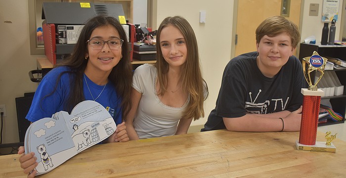 Vittoria Ferrisi Alvarez, Gracie Nichols and Sawyer Nowicki, all seventh graders at Dr. Mona Jain Middle School, created the book called "Snowball's Iceberg Incident" to compete in the Children's Stories event for Technology Student Association.