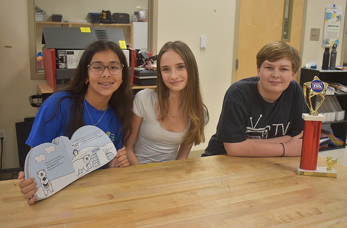 Vittoria Ferrisi Alvarez, Gracie Nichols and Sawyer Nowicki, all seventh graders at Dr. Mona Jain Middle School, created the book called "Snowball's Iceberg Incident" to compete in the Children's Stories event for Technology Student Association.