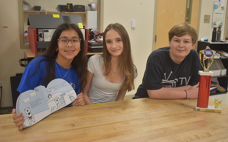 Vittoria Ferrisi Alvarez, Gracie Nichols and Sawyer Nowicki, all seventh graders at Dr. Mona Jain Middle School, created the book called "Snowball's Iceberg Incident" to compete in the Children's Stories event for Technology Student Association.