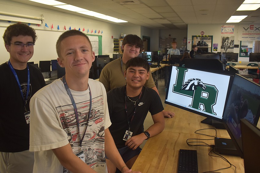 Paul Jordan, Cooper Kelly, Alexander Hong and Kaden Oda (front) were among the students to make a video about George Washington playing football for the New England Patriots for the Digital Video Production event.