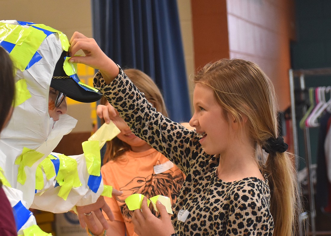 Novalee Roberts, a third grader at Myakka City Elementary, is eager to participate in the Tape the Principal (Carol Ricks) event.