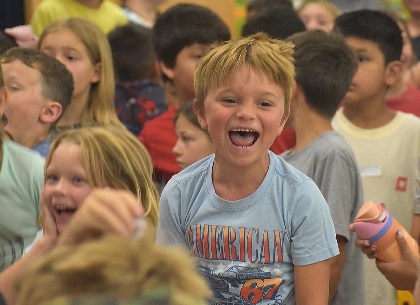 Riley Shewbridge and Brantley Farchette, first graders at Myakka Elementary, celebrate their win for house Equus. Out of the four houses, they earned the most points throughout second semester.
