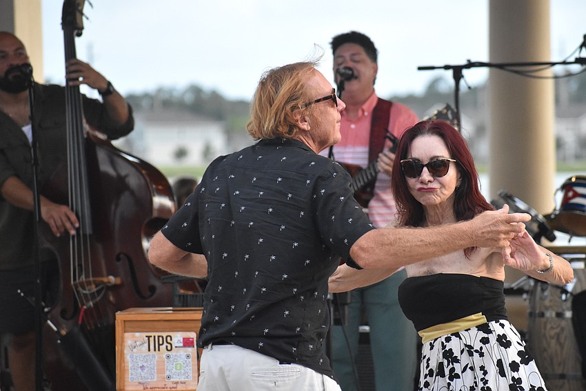 To the tunes of the Bri Rivera Band, Sarasota's Brian King and Nancy Davis feel 