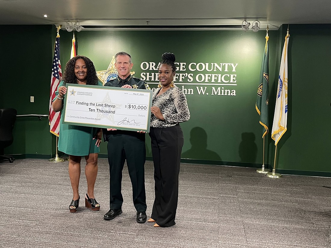 Sheriff John Mina presented a $10,000 check to Finding the Lost Sheep Street Ministry Wednesday, May 6.