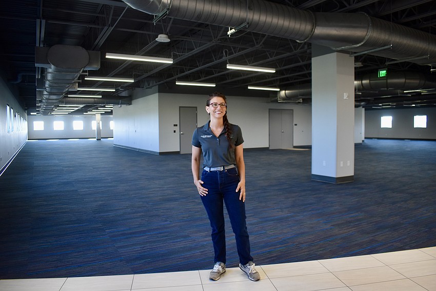 Commissioner Amanda Ballard stands in the newly finished second floor of the Lakewood Ranch Library.