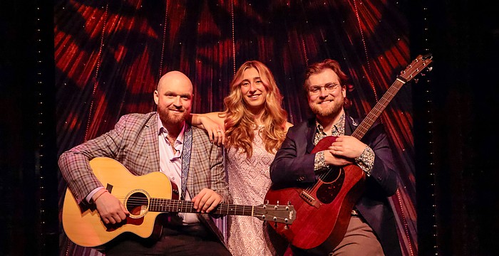 Collin Purcell, Katie Blackwell and Brian Ott bring back the feel-good era of folk music in "Leaving on a Jet Plane."