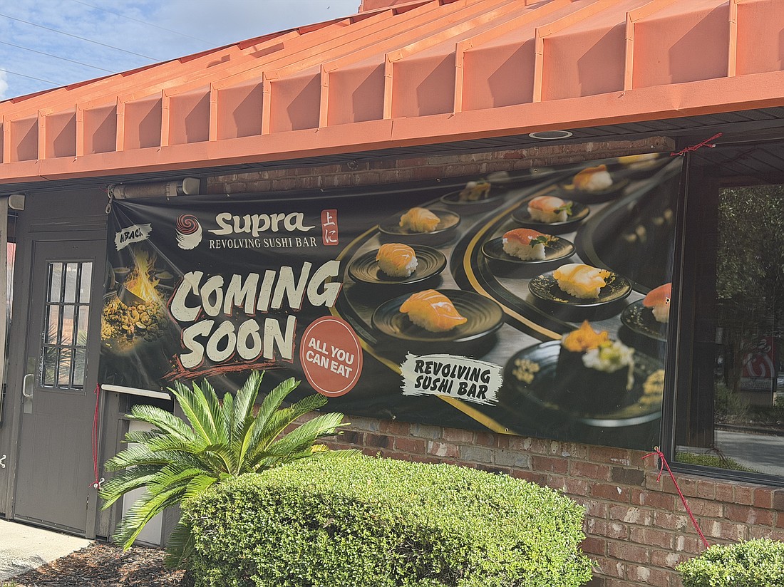 The former Tinseltown Hooters will become a new sushi restaurant in the market.
