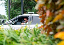 A Longboat Key police officer measures the speed of vehicles traveling on Gulf of Mexico Drive. Traffic enforcement in gated communities require a memorandum of understanding with the Homeowners Association, said Longboat Key Police Chief Russ Mager.