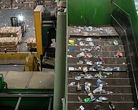 Plastic bottles have been separated from other recyclables as they travel along a conveyor line at the Circular Services materials recovery facility in Sarasota.