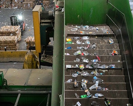 Plastic bottles have been separated from other recyclables as they travel along a conveyor line at the Circular Services materials recovery facility in Sarasota.