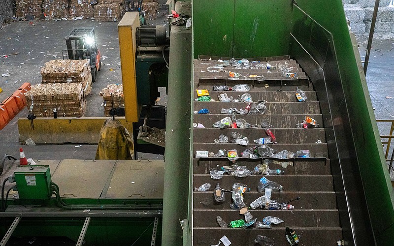 Plastic bottles have been separated from other recyclables as they travel along a conveyor line at the Circular Services materials recovery facility in Sarasota.