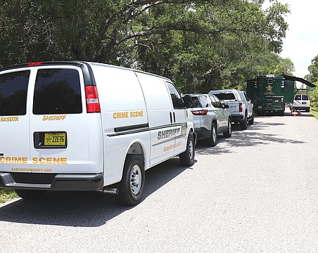 Sarasota County Sheriff's Office mobile crime units set up shop on Leonard Reid Avenue following the discovery of partial human skeletal remains on Friday, May 29.