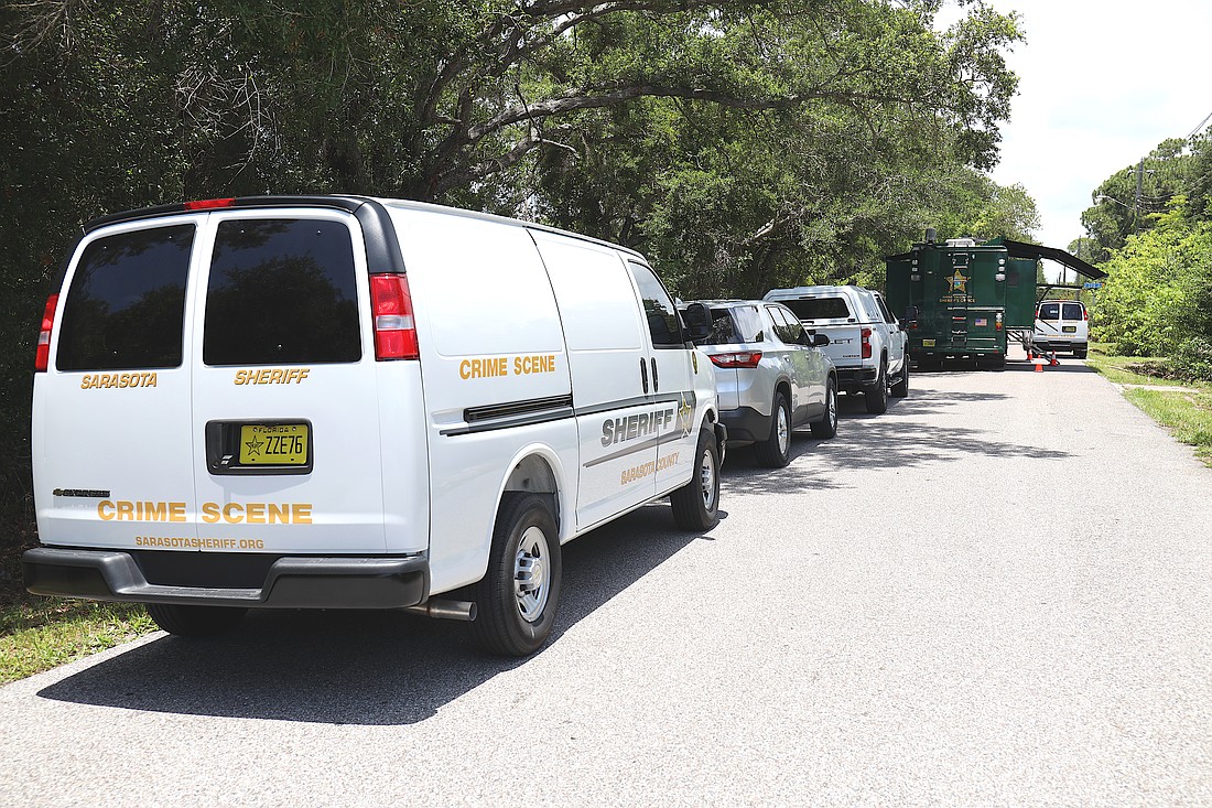 Sarasota County Sheriff's Office mobile crime units set up shop on Leonard Reid Avenue following the discovery of partial human skeletal remains on Friday, May 29.