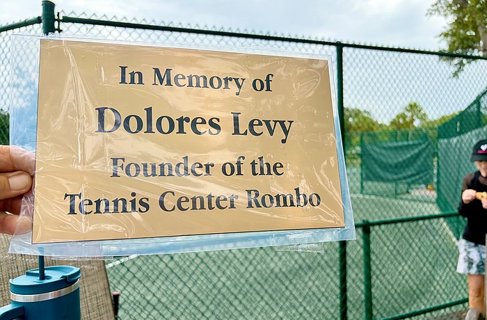 Longboat Key Tennis Center members and friends of Dolores Levy honored her memory with the unveiling of a new plaque at the center last weekend.