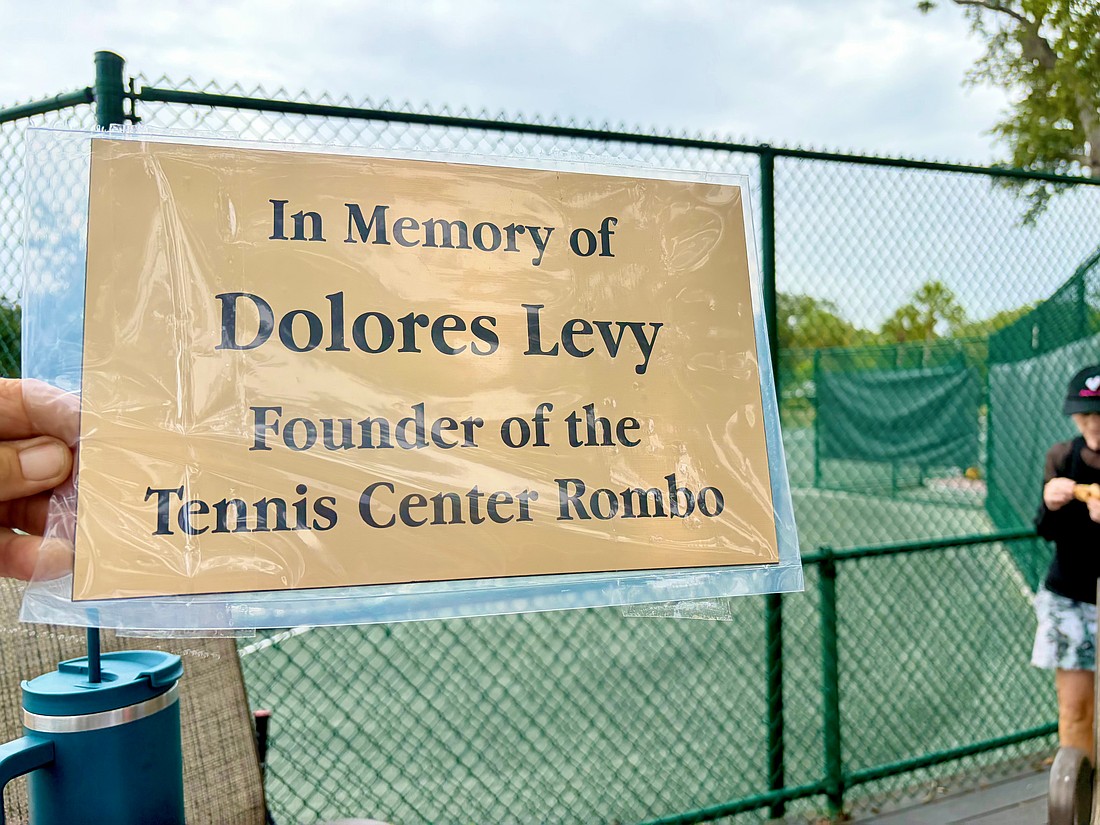 Longboat Key Tennis Center members and friends of Dolores Levy honored her memory with the unveiling of a new plaque at the center last weekend.