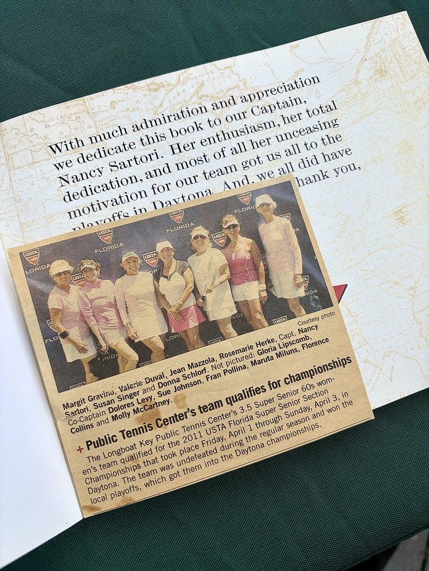 Friends of Dolores Levy brought photos, newspaper clippings and more to a gathering at the Longboat Key Tennis Center, where a plaque honoring her memory was unveiled on May 30.