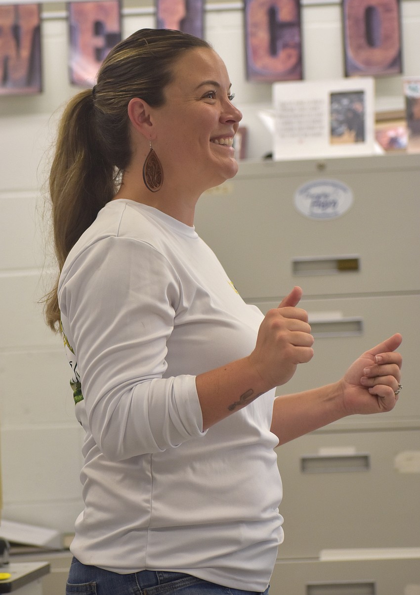 McKenzie Gorskey, one of the agriculture teachers at Lakewood Ranch High alongside Sophia Jaramillo-Vasconez, quizzes the campers on what dairy products are made out of milk as they prepare to make their own butter.