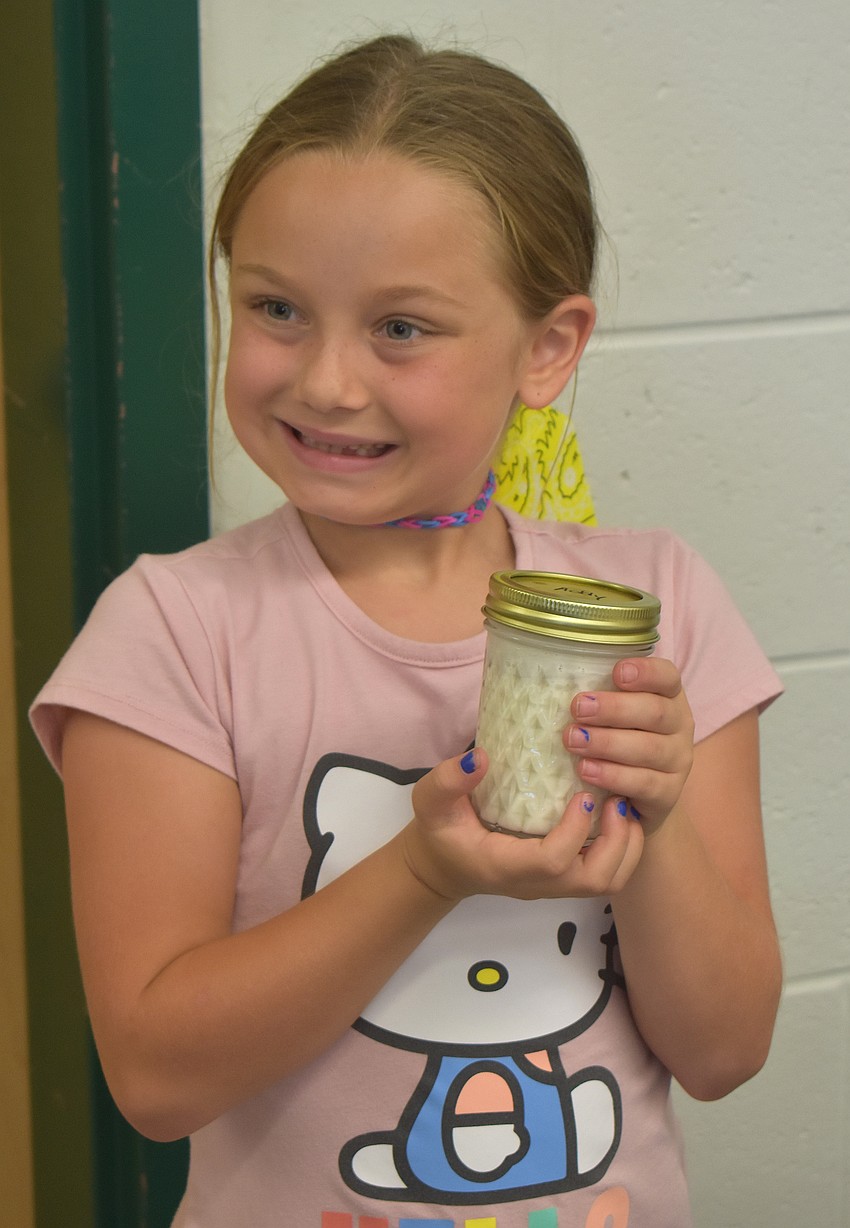 Lakewood Ranch's Addison Hollands, 7, poses with her 