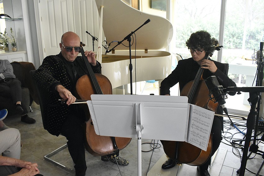 Steve Kramer and his son Victor perform.