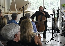 Steve Kramer plays the cello.