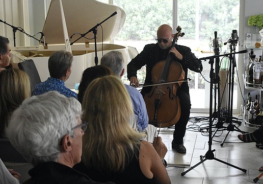 Steve Kramer plays the cello.