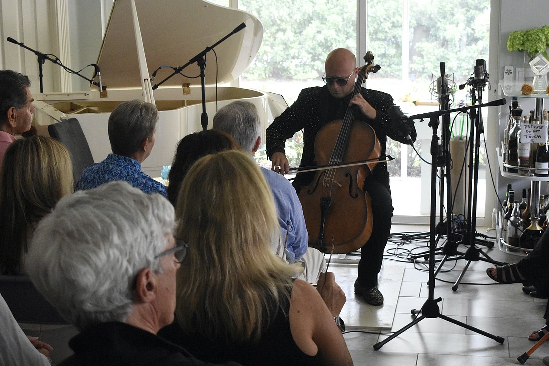 Steve Kramer plays the cello.