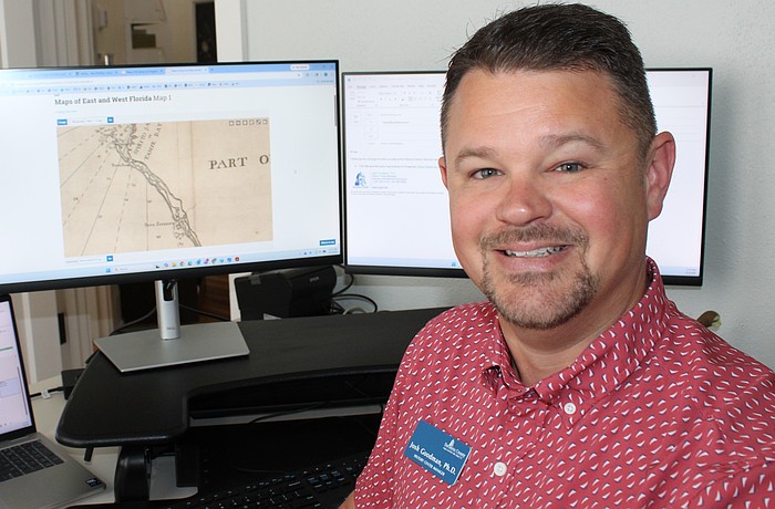 Sarasota History Center Manager Josh Goodman is an avid historian who loves checking out maps of the region in the 1700s.