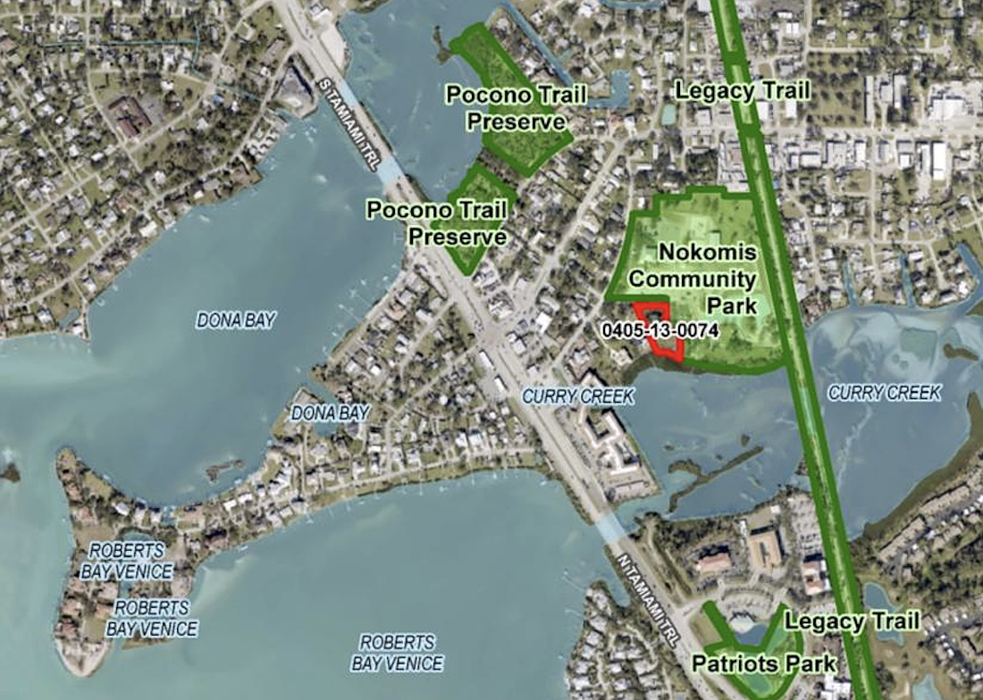 The 1.01-acre property is on Nash Avenue, with 145 feet of frontage on Curry Creek.